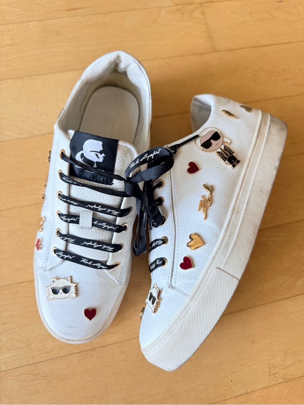 Karl Lagerfeld White Sneakers with Black Laces and Gold & Red Charms